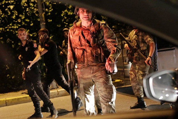 Turkish military detaining Turkish police in Istanbul. Getty Images